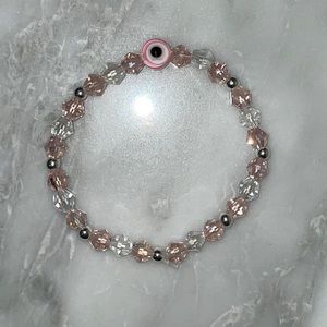 Clear & pink handmade stretchable crystal evil eye